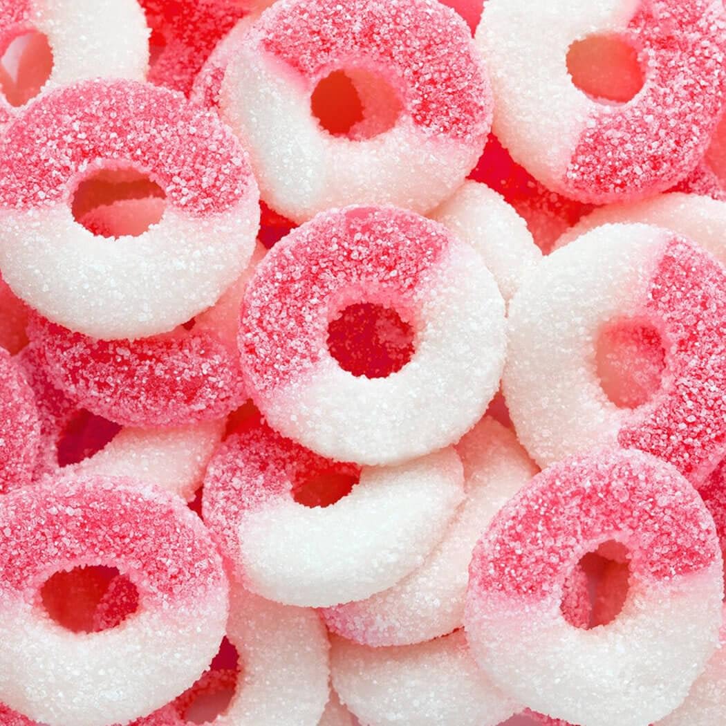 Delta 9 Watermelon and Apple Rings feature red and white sugar-coated, ring-shaped gummies infused with THCa.