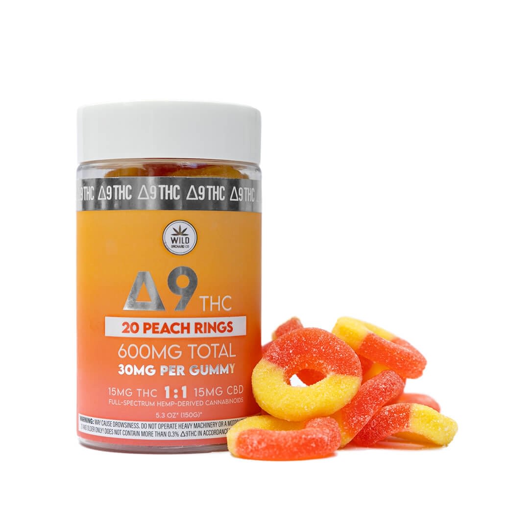 A jar labeled "Δ9 THC" holds 20 peach rings, infused with a total of 600mg THC and CBD. Gummies are scattered alongside, akin to vape carts ready for use.