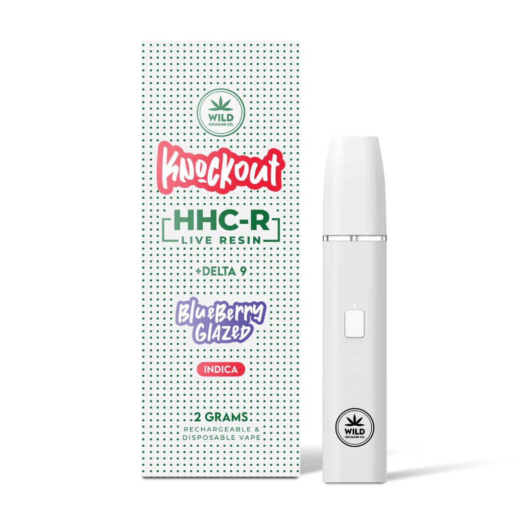 The white vape pen is next to a package labeled "Knockout 'Strawberry Sprinkles' HHC-R Live Resin," highlighting a 2-gram rechargeable, disposable vape ideal for fans of carts and THCp-infused products.